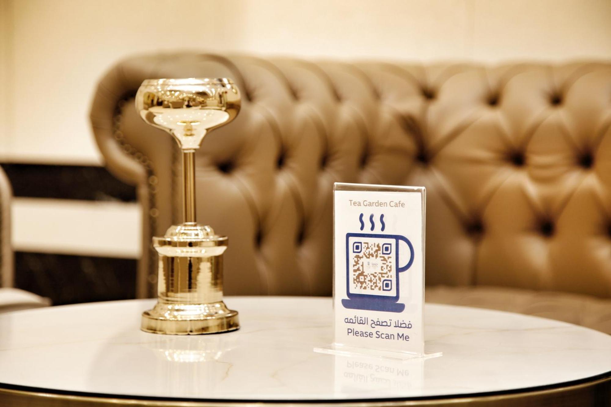 Отель Maden Alrawda Медина Экстерьер фото QR code in a coffee shop